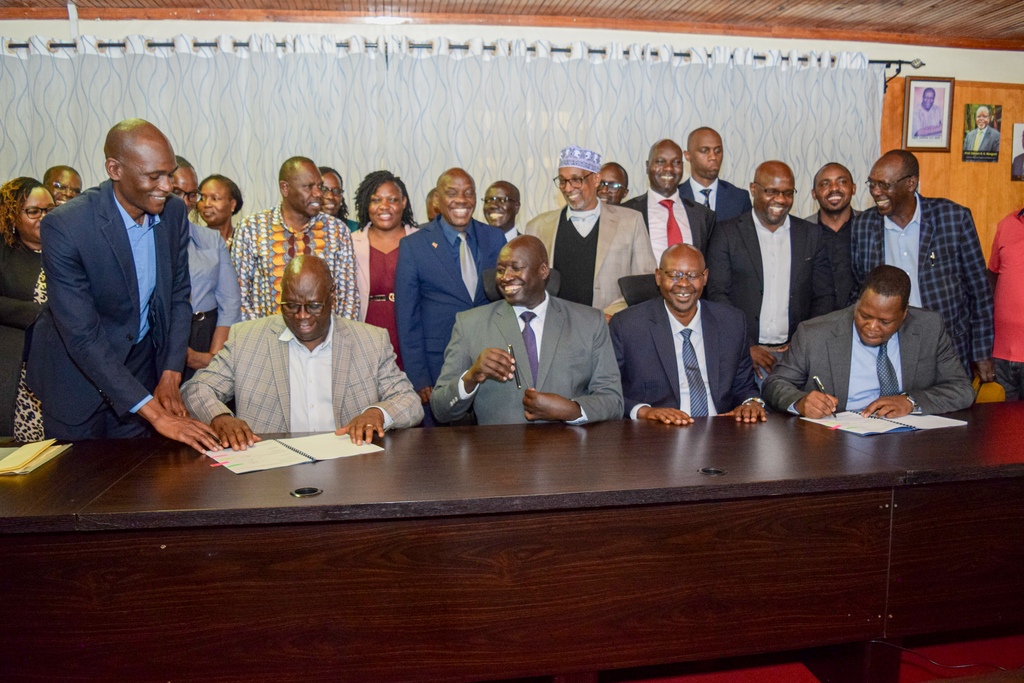 UoE and KNCCI officials during the MoU signing